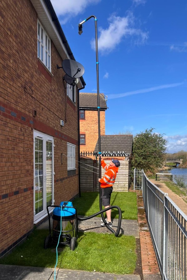 Patio cleaning with pressure washer